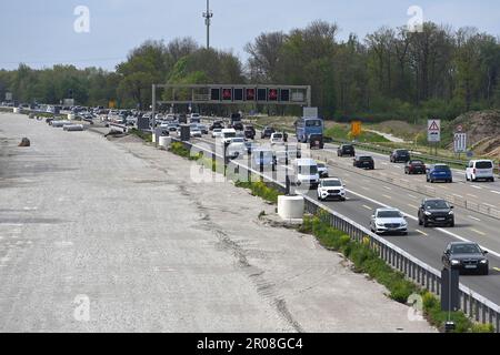 Extension of the A99 motorway near Aschheim in the district of Munich. Major construction site - 8 lane extension of the A99, motorway junction Muenchen Ost. Construction site traffic on the A99 motorway near Munich, construction site, road construction. ? Stock Photo