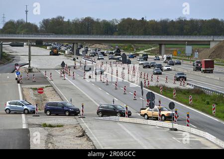 Extension of the A99 motorway near Aschheim in the district of Munich. Major construction site - 8 lane extension of the A99, motorway junction Muenchen Ost. Construction site traffic on the A99 motorway near Munich, construction site, road construction. ? Stock Photo