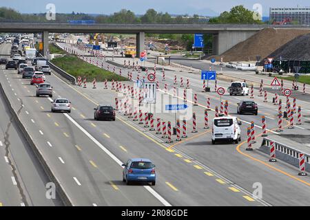 Extension of the A99 motorway near Aschheim in the district of Munich. Major construction site - 8-lane expansion of the A99, motorway junction Muenchen Ost. Construction site traffic on the A99 motorway near Munich, construction site, road construction. ? Stock Photo