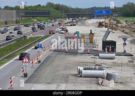 Extension of the A99 motorway near Aschheim in the district of Munich. Major construction site - 8 lane extension of the A99, motorway junction Muenchen Ost. Construction site traffic on the A99 motorway near Munich, construction site, road construction. ? Stock Photo