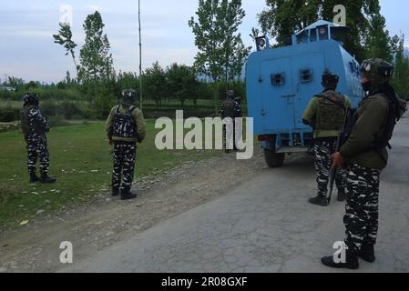 Baramulla Kashmir, India. 06th May, 2023. Indian Paramilitary troopers Stand Guard near the site of gunfight in Karhama Kunzer area of Baramulla district. 1 Lashkar-e-Taiba (LET) militant was killed in a joint operation launched by Police, CRPF army officials said. on May 06, 2023 in Baramulla Kashmir, India. (Credit Image: © Firdous Nazir/eyepix via ZUMA Press Wire) EDITORIAL USAGE ONLY! Not for Commercial USAGE! Stock Photo