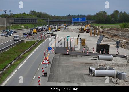 Extension of the A99 motorway near Aschheim in the district of Munich. Major construction site - 8 lane extension of the A99, motorway junction Muenchen Ost. Construction site traffic on the A99 motorway near Munich, construction site, road construction. ? Stock Photo