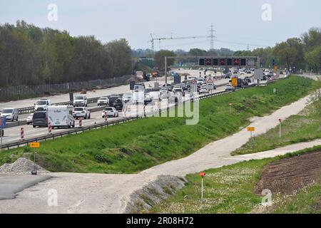 Extension of the A99 motorway near Aschheim in the district of Munich. Major construction site - 8 lane extension of the A99, motorway junction Muenchen Ost. Construction site traffic on the A99 motorway near Munich, construction site, road construction. ? Stock Photo