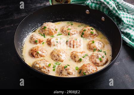 Swedish meatballs in cream sauce. Swedish cuisine. Turkey meatballs. Stock Photo