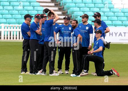 7 May, 2023, London, UK. The Surrey team wait for the next man in as Surrey Disability Cricket Scheme 1st XI take on Middlesex Disabled CC in the DB40 Quest National Disabled Cricket League at The Kia Oval Stock Photo