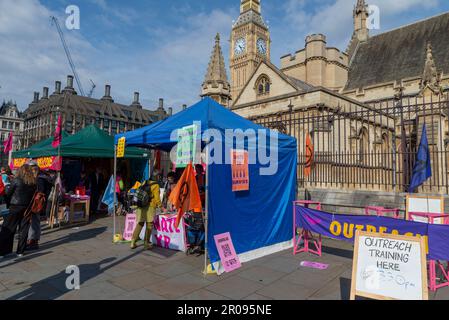 Extinction Rebellion encampment around Parliament Square in front of the Houses of Parliament, London, UK. Welcome camp with training times Stock Photo