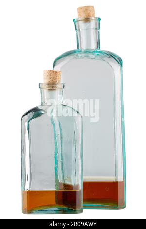Old west whiskey bottles isolated on white background Stock Photo - Alamy