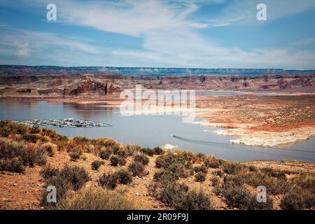 Wahweap Marina sits at the west end of Lake Powell on the border of Utah and Arizona near Page, Arizona.  Photo circa 2016. Stock Photo