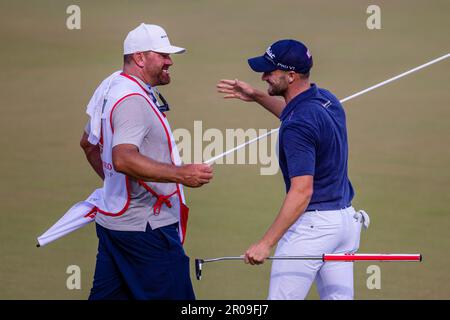 May 7, 2023: Wyndham Clark celebrates with his caddie John Ellis after winning the 2023 Fargo Championship at Hollow Club in Charlotte, NC. (Scott Kinser/Cal Sport Media)(Credit Image: © Scott Kinser/Cal Sport Media) (Cal Sport Media via ...