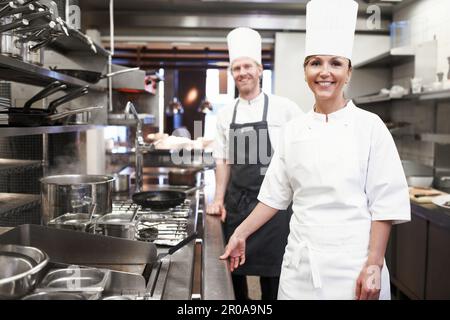 From our stove to your dining table. Portrait of chefs in a professional kitchen. Stock Photo