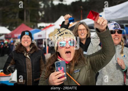 2023 Ski East.  Parents, friends, team coaches, high schools, sponsors and more than 300 Massachusetts high school alpine ski racers gathered at Berkshire East Ski Resort, 123 miles (200 km) West of Boston, MA, for the 2023 State championship slalom and giant slalom championships on March 1 2023. Photo shows Racers Mothers cheering for their racers during the competition. Stock Photo