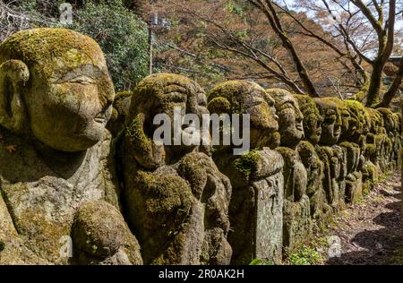 Kyoto, Japan - March 27, 2023: Kawaii little buddhas statues in Otagi Nenbutsu-ji temple in Kyoto, Japan Stock Photo