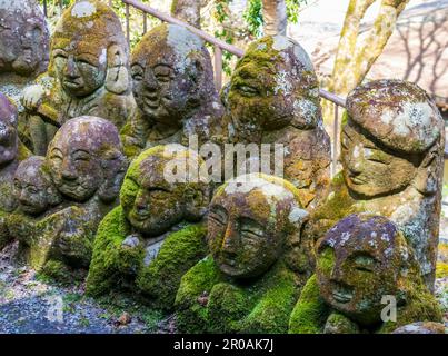 Kyoto, Japan - March 27, 2023: Kawaii little buddhas statues in Otagi Nenbutsu-ji temple in Kyoto, Japan Stock Photo