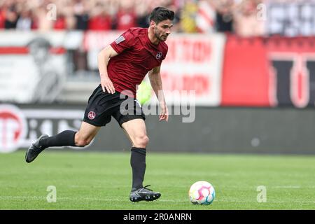 Nuremberg, Germany. 07th May, 2023. Soccer: 2nd Bundesliga, 1. FC Nuremberg - 1. FC Kaiserslautern, Matchday 31 at Max Morlock Stadium. Christopher Schindler from Nuremberg plays the ball. Credit: Daniel Karmann/dpa - IMPORTANT NOTE: In accordance with the requirements of the DFL Deutsche Fußball Liga and the DFB Deutscher Fußball-Bund, it is prohibited to use or have used photographs taken in the stadium and/or of the match in the form of sequence pictures and/or video-like photo series./dpa/Alamy Live News Stock Photo