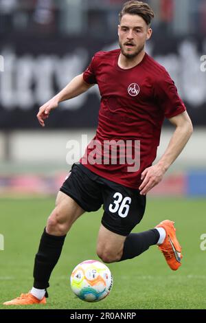 Nuremberg, Germany. 07th May, 2023. Soccer: 2nd Bundesliga, 1. FC Nuremberg - 1. FC Kaiserslautern, Matchday 31 at Max Morlock Stadium. Nuremberg's Lukas Schleimer plays the ball. Credit: Daniel Karmann/dpa - IMPORTANT NOTE: In accordance with the requirements of the DFL Deutsche Fußball Liga and the DFB Deutscher Fußball-Bund, it is prohibited to use or have used photographs taken in the stadium and/or of the match in the form of sequence pictures and/or video-like photo series./dpa/Alamy Live News Stock Photo