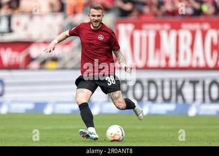 Nuremberg, Germany. 07th May, 2023. Soccer: 2nd Bundesliga, 1. FC Nuremberg - 1. FC Kaiserslautern, Matchday 31 at Max Morlock Stadium. Nuremberg's Jannes-Kilian Horn plays the ball. Credit: Daniel Karmann/dpa - IMPORTANT NOTE: In accordance with the requirements of the DFL Deutsche Fußball Liga and the DFB Deutscher Fußball-Bund, it is prohibited to use or have used photographs taken in the stadium and/or of the match in the form of sequence pictures and/or video-like photo series./dpa/Alamy Live News Stock Photo