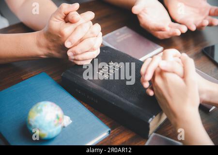 Concept of Christian ministry. Small groups pray together for the ...