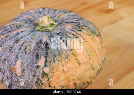 Fresh Ripe Thai Pumpkin or Squash Isolated on Wooden background Stock Photo