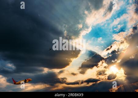 Watching Air Planes Fly Away Stock Photo