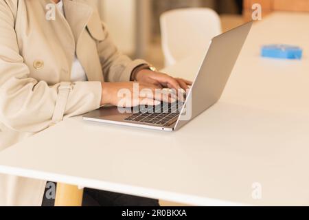 Young woman in coworking space. Stock Photo