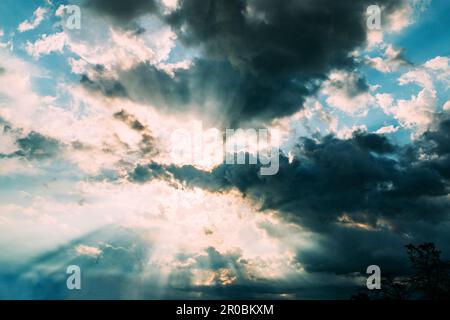 Clouds Bursting with Light Rays Stock Photo