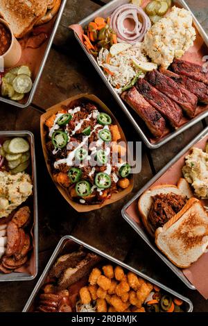 Tabletop Scene of Texas BBQ Trays Stock Photo