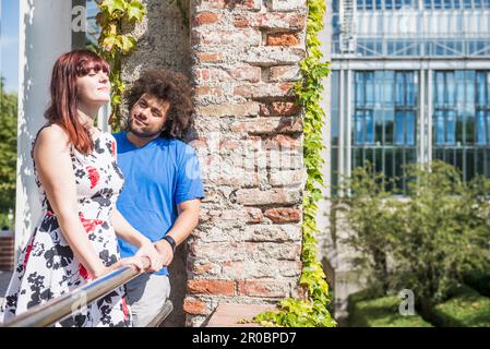 Relaxed young couple spending time outdoors Stock Photo