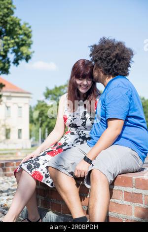 Relaxed young couple spending time outdoors Stock Photo