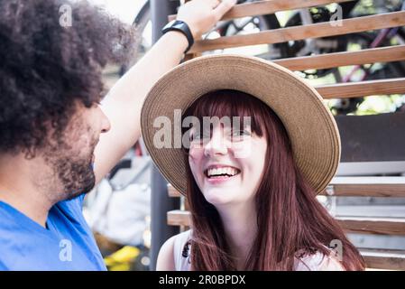 Happy young couple spending time outdoors Stock Photo