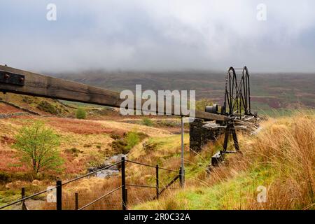 Remains of Cwm Ciprwth Copper Mine above Cwm Pennant in Snowdonia National Park. View along restored flat rods and water wheel. Gwynedd Wales UK Stock Photo