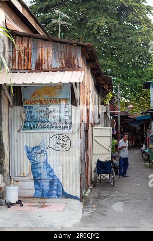 Georgetown, Penang, Malaysia - September 03, 2014: Everyday life at one of the main streets in historical Georgetown, Penang, Malaysia Stock Photo