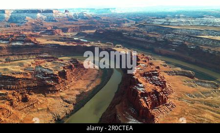 An aerial view of the Colorado River flowing between cliffs in Dead Horse Point State Park. Utah, USA. Stock Photo