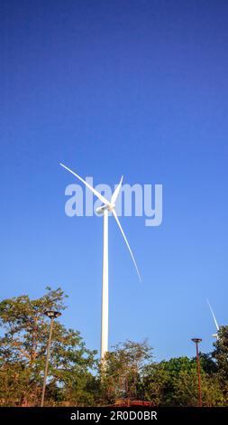 A wind turbine is a wind turbine that takes the kinetic energy from the movement of the wind and converts it into mechanical energy. Then use mechanic Stock Photo