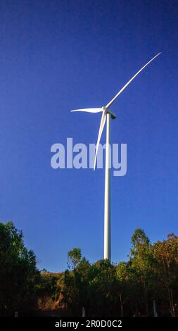 A wind turbine is a wind turbine that takes the kinetic energy from the movement of the wind and converts it into mechanical energy. Then use mechanic Stock Photo