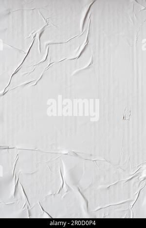 Crinkled white poster paper texture background Stock Photo