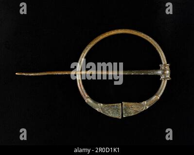 Brooch, Saxon.. Made from Anglo-Saxon Copper Alloy II, Amber & Other Metals. Stock Photo
