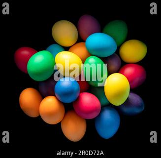 Detail shot of some colorful easter eggs in black back Stock Photo