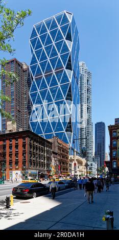 The diagrid glass Hearst Tower was built in 2006 atop the stone Hearst Magazine Building of 1928. Stock Photo