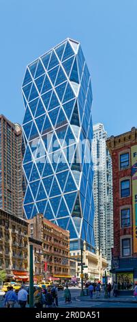 The diagrid glass Hearst Tower was built in 2006 atop the stone Hearst Magazine Building of 1928. Stock Photo