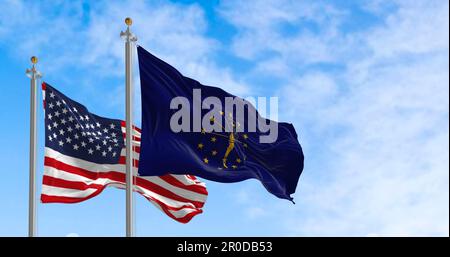 Indiana state flag waving with the national flag of the United States of America on a clear day. 3d illustration render. Fluttering fabric. Stock Photo