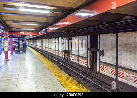 New York, USA - July 11, 2010:  people wait for the arriving train in New York metro. Stock Photo