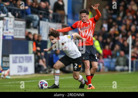 Lewie Coyle #2 of Hull City and Louie Watson #20 of Luton Town tussle for the ball during the Sky Bet Championship match Luton Town vs Hull City at Kenilworth Road, Luton, United Kingdom, 8th May 2023  (Photo by Arron Gent/News Images) Stock Photo