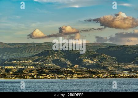 The mountainous coasts of Calabria in the Strait of Messina. The cities of Villa San Giovanni and the metropolitan city of Reggio Calabria. Messina Stock Photo