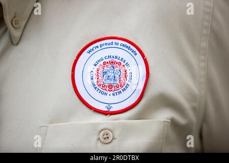 A Scouts occasional badge celebrating the Coronation worn by Gillian McEvoy, Explorer Scout Leader from Bangor, Northern Ireland, who was invited to the Coronation as representative of the Scouts. Picture date: Monday May 8, 2023. Stock Photo