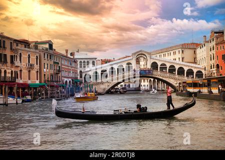 Romanic Venetian sunset over Grand canal and Rialto bridge. Venice , Italy.  june 2012 Stock Photo