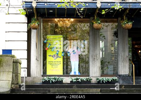 A hotel window in Liverpool is decorated for the Eurovision song contest Stock Photo