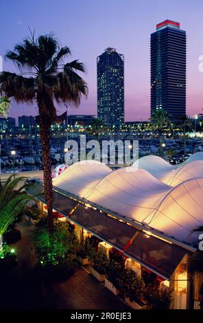 Restaurant at the Olympic harbour at night, Hotel Arts in the background, Port Olympic, Barcelona, Catalonia, Spain Stock Photo