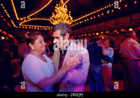 Older couples dancing the Cha-Cha at the Paloma Club in Raval, Barcelona, Catalonia, Spain Stock Photo