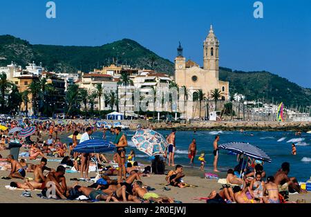 Beach Sitges Spain, Platja de la Fragata, Fragata Beach, St. Bartomeu I Santa Tecla church, Sitges, Costa de Garraf, Spain Stock Photo