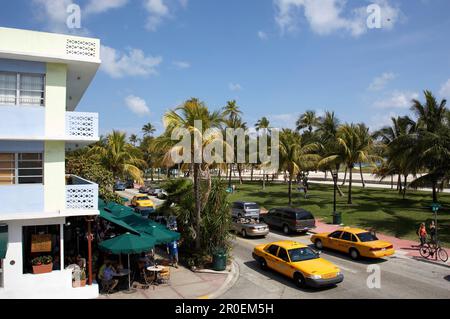 Taxis crossing on Ocean Drive, South Beach, Miami Florida, USA Stock Photo